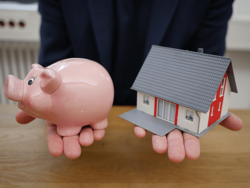 a piggy bank representing saving for a house